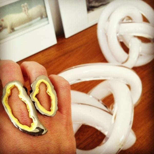 Shown here is the small and large Geode sizes worn as a double - in black platinum and 22kt gold plate.