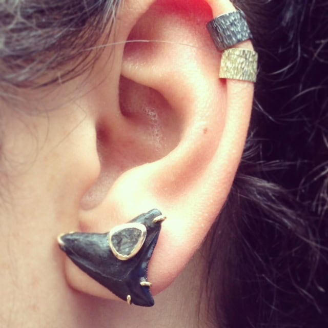 Shown here in gold & gunmetal black, worn with Padés diamond slice shark tooth earring.